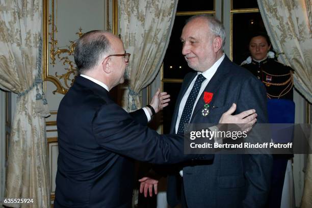 French Prime Minister Bernard Cazeneuve and Francois Berleand attend Francois Berleand is elevated to the rank of "Officier de la Legion d'Honneur"...