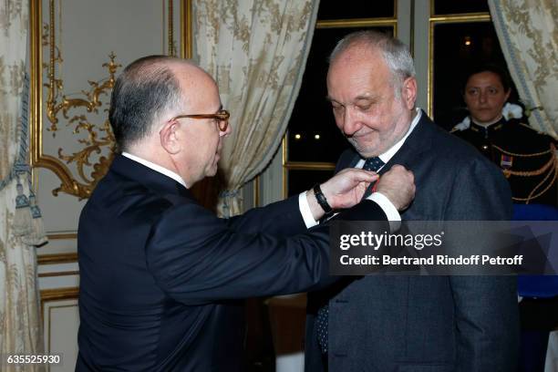 French Prime Minister Bernard Cazeneuve and Francois Berleand attend Francois Berleand is elevated to the rank of "Officier de la Legion d'Honneur"...