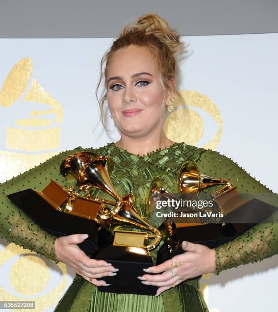 Singer Adele poses in the press room at the 59th GRAMMY Awards at Staples Center on February 12, 2017 in Los Angeles, California.