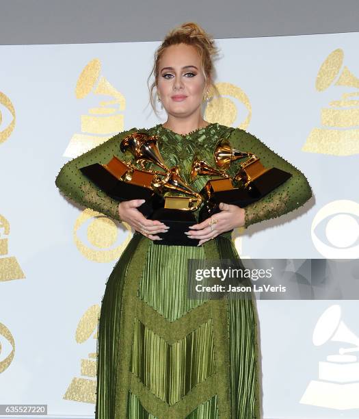 Singer Adele poses in the press room at the 59th GRAMMY Awards at Staples Center on February 12, 2017 in Los Angeles, California.