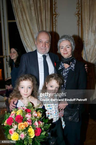 Francois Berleand, his companion Alexia Stresi, their twins daughters Lucie and Adele attend Francois Berleand is elevated to the rank of "Officier...