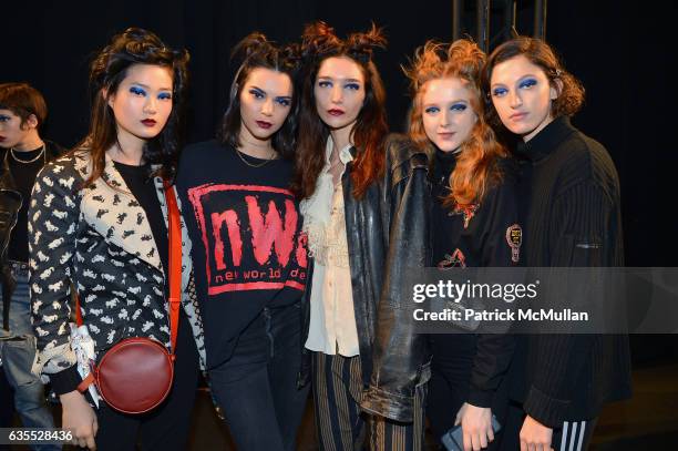 Hyun Ji Shin, Kendall Jenner, Janice Alida, Madison Stubbington, and Amber Witcomb pose backstage at Anna Sui Fall/Winter 2017 Show during, New York...