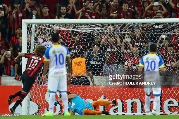 Felipe Gedoz of Brazil's Atletico Paranaense celebrates the second goal he scored against Paraguay's Deportivo Capiata during their Libertadores Cup...