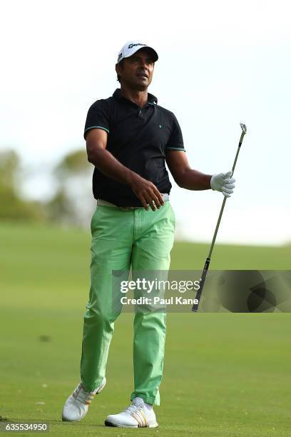 Jyoti Randhawa of India watches his second shot on the 13th hole during round one of the ISPS HANDA World Super 6 at Lake Karrinyup Country Club on...