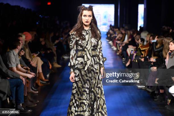 Model walks the runway at the Anna Sui Autumn Winter 2017 fashion show during New York Fashion Week on February 15, 2017 in New York, United States.