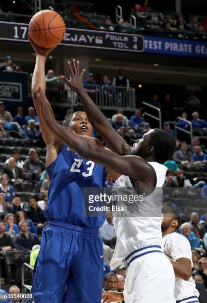 Justin Patton of the Creighton Bluejays takes a shot as Ismael Sanogo of the Seton Hall Pirates defends on February 15, 2017 at Prudential Center in...