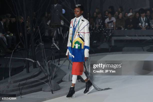 Model walks the runway at the Thom Browne Fall/Winter 2017 collection at Skylight Modern during New York Fashion Week on February 15, 2017 in New...