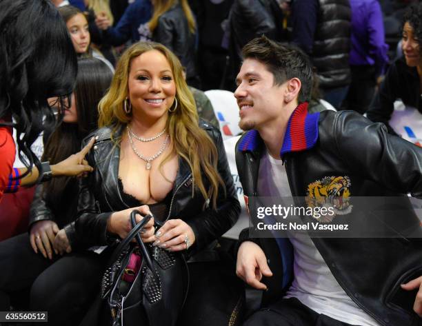 Mariah Carey and Bryan Tanaka attend a basketball game between the Atlanta Hawks and the Los Angeles Clippers at Staples Center on February 15, 2017...