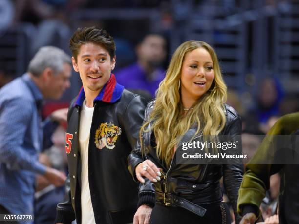 Mariah Carey and Bryan Tanaka attend a basketball game between the Atlanta Hawks and the Los Angeles Clippers at Staples Center on February 15, 2017...