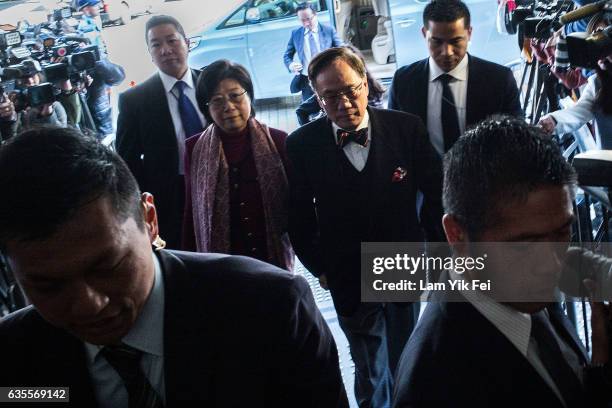 Former Hong Kong Chief Executive Donald Tsang and his wife Selina Tsang Pou Siu-mei arrive at the High Court during his trial on charges of...