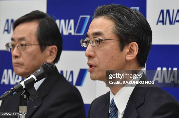Yuji Hirako , newly-named president of Japanese airline All Nippon Airways , answers questions during a press conference in Tokyo on February 16,...