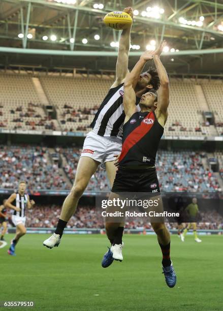Jobe Watson of the Bombers is challenged by Tyson Goldsack of the Magpies during the 2017 JLT Community Series match between the Collingwood Magpies...
