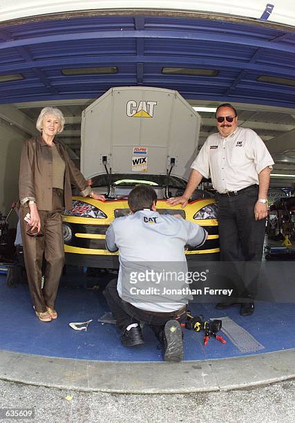 Winston Cup team owners Bill and Gail Davis of Bill Davis Racing poses with the Dodge Intrepid of driver Ward Burton at the Daytona Speedweeks at...