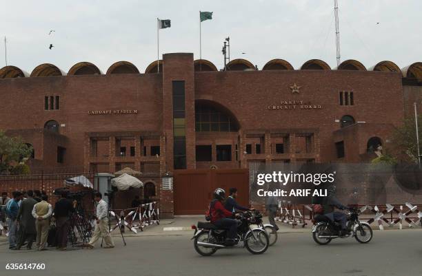 Pakistani media personnel gather outside the Gaddafi Cricket Stadium in Lahore on February 16, 2017. Pakistani cricket officials have vowed to stage...