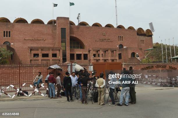 Pakistani media personnel gather outside the Gaddafi Cricket Stadium in Lahore on February 16, 2017. Pakistani cricket officials have vowed to stage...