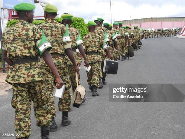 The soldiers of the 40th battalion of the Burundian Army wait for the plane which belongs to United Nations , at Bujumbura International Airport...