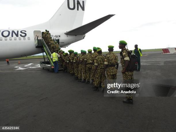 The soldiers of the 40th battalion of the Burundian Army board the plane which belongs to United Nations at Bujumbura International Airport before...