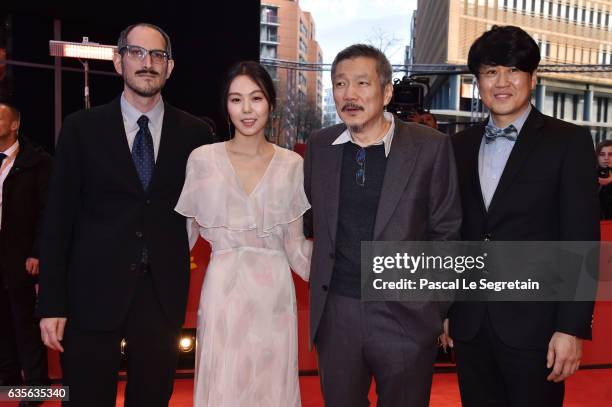 Mark Peranson, actress Kim Min-hee, director Hong Sang-soo and Park Hong-Yeol attend the 'On the Beach at Night Alone' premiere during the 67th...