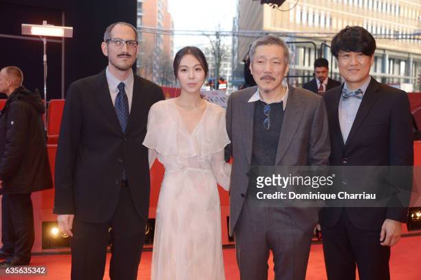 Mark Peranson, actress Kim Min-hee, director Hong Sang-soo and Park Hong-Yeol attend the 'On the Beach at Night Alone' premiere during the 67th...