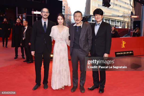 Mark Peranson, actress Kim Min-hee, director Hong Sang-soo and Park Hong-Yeol attend the 'On the Beach at Night Alone' premiere during the 67th...