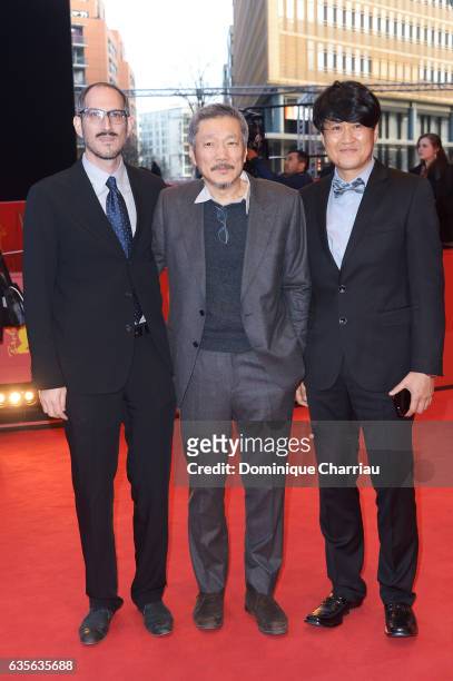 Mark Peranson,director Hong Sang-soo and Park Hong-Yeol attend the 'On the Beach at Night Alone' premiere during the 67th Berlinale International...