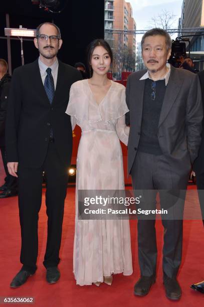 Mark Peranson, actress Kim Min-hee, director Hong Sang-soo attend the 'On the Beach at Night Alone' premiere during the 67th Berlinale International...
