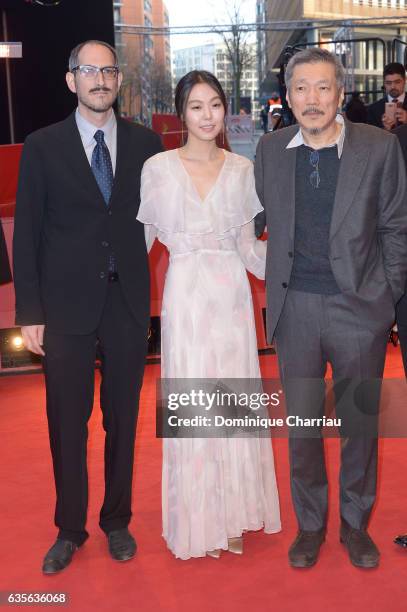 Mark Peranson, actress Kim Min-hee, director Hong Sang-soo attend the 'On the Beach at Night Alone' premiere during the 67th Berlinale International...