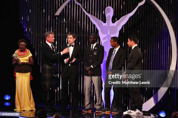 Laureus Ambassador David Coulthard speaks with the winners of the Laureus Sport For Good award, members of the Olympic Refugee team and Laureus...