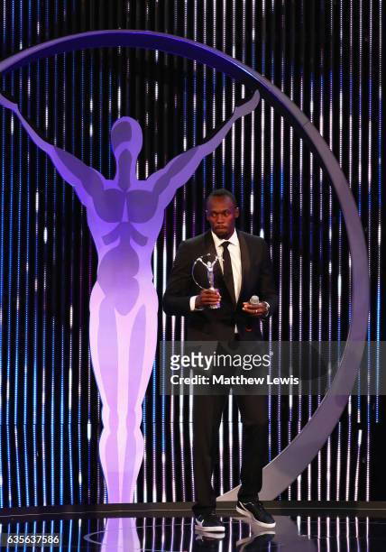 Athlete Usain Bolt of Jamaica accepts his Laureus World Sportsman of the Year award on stage during the 2017 Laureus World Sports Awards at the Salle...