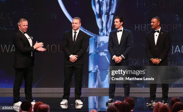 Laureus Academy Chairman Sean Fitzpatrick introduces the new Laureus Academy Members Sir Chris Hoy, Fabian Cancellara and Ruud Gullit on stage during...