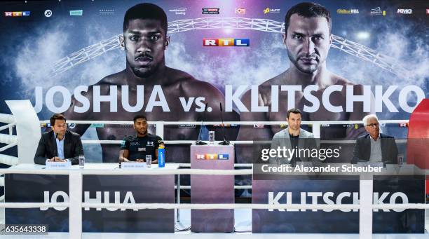 Manager Eddie Hearn, Joshua Anthony, Wladimir Klitschko and Manager Bernd Boente are seen during the press conference with Anthony Joshua and...