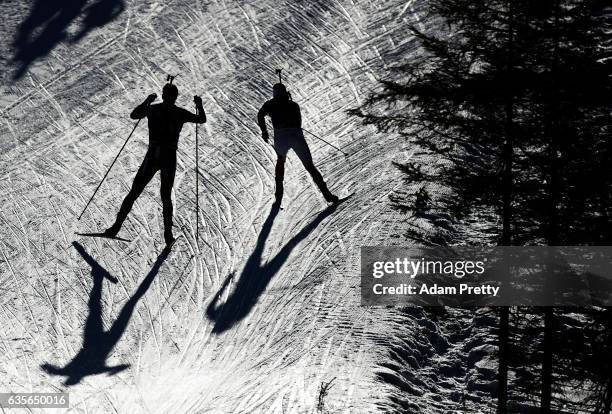 Johannes Thingnes Boe of Norway passes another competitor during the Men's 20km Individual competition of the IBU World Championships Biathlon 2017...