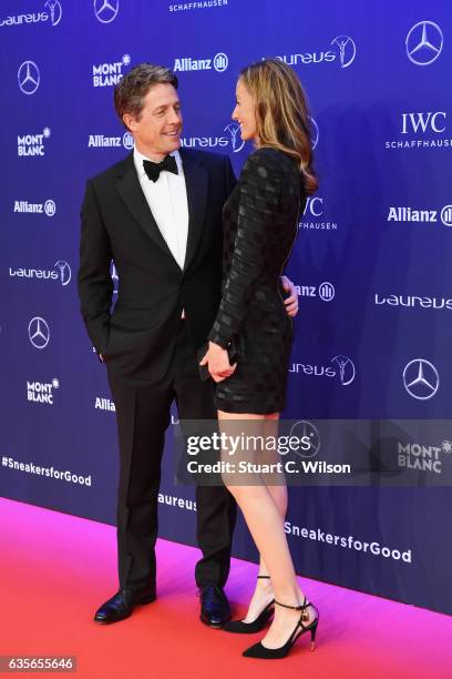 Host Hugh Grant and Anna Eberstein attend the 2017 Laureus World Sports Awards at the Salle des Etoiles,Sporting Monte Carlo on February 14, 2017 in...