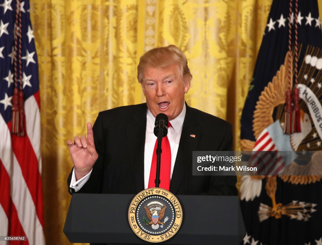 U.S. President Donald Trump speaks during a news conference... News ...