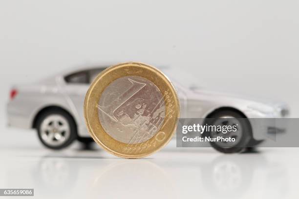 Model car is seen with Euro currency units.