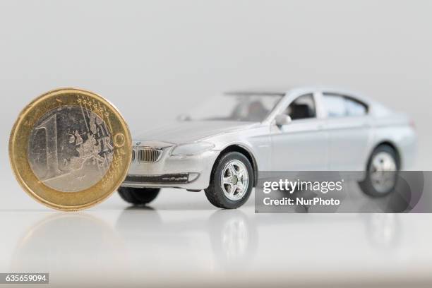 Model car is seen with Euro currency units.