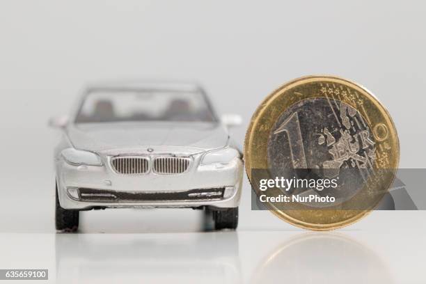 Model car is seen with Euro currency units.