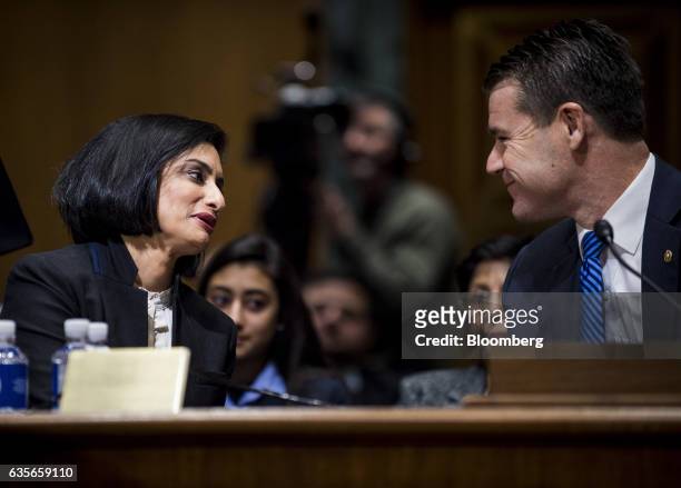 Seema Verma, Centers for Medicare and Medicaid Services administrator nominee for U.S. President Donald Trump, left, speaks with Senator Todd Young,...
