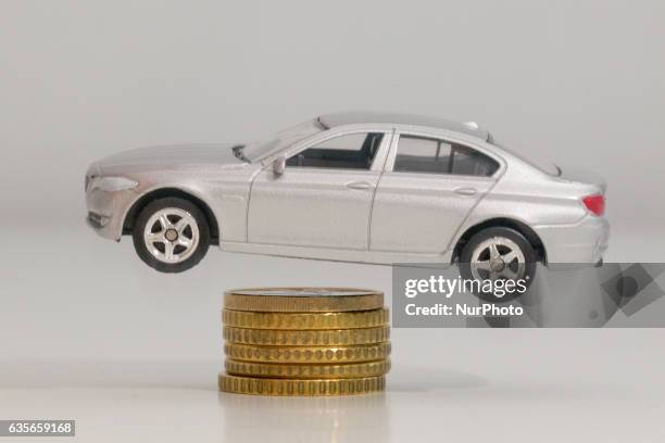 Model car is seen with Euro currency units.