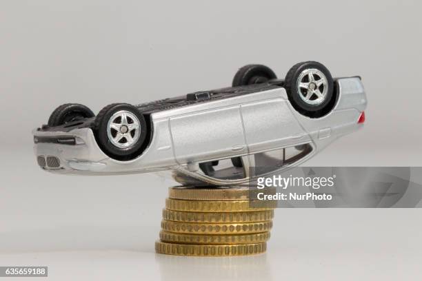 Model car is seen with Euro currency units.