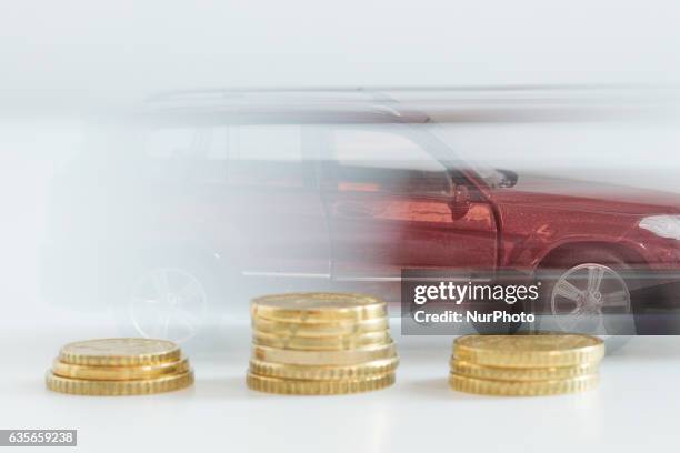 Model car is seen with Euro currency units.