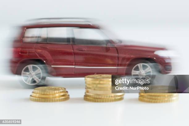 Model car is seen with Euro currency units.