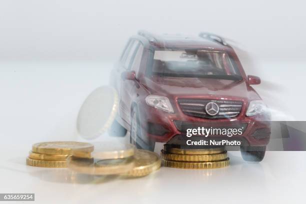 Model car is seen with Euro currency units.