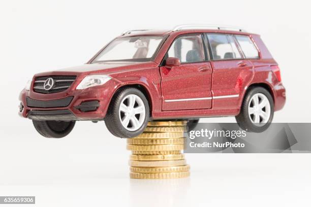 Model car is seen with Euro currency units.