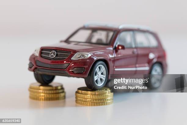 Model car is seen with Euro currency units.