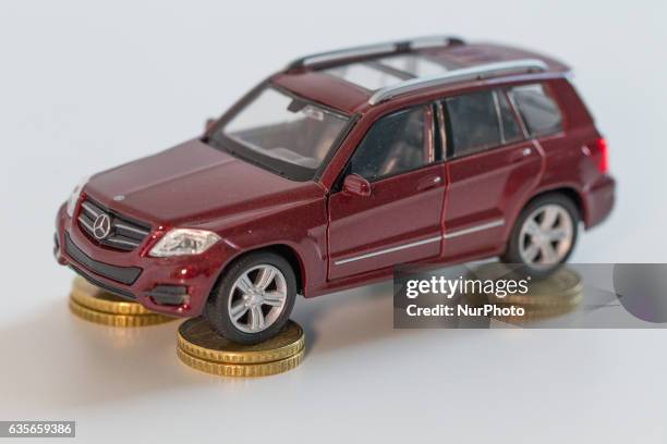 Model car is seen with Euro currency units.