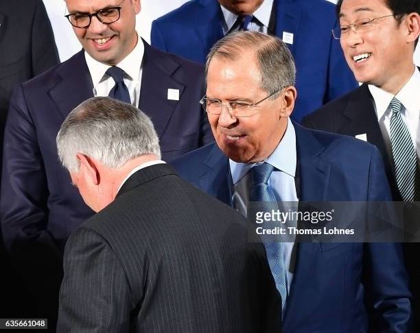 Secretary of State Rex Tillerson and the Russian Foreign Minister Sergei Lavrov stand in the first row together during the family photo of the G20...