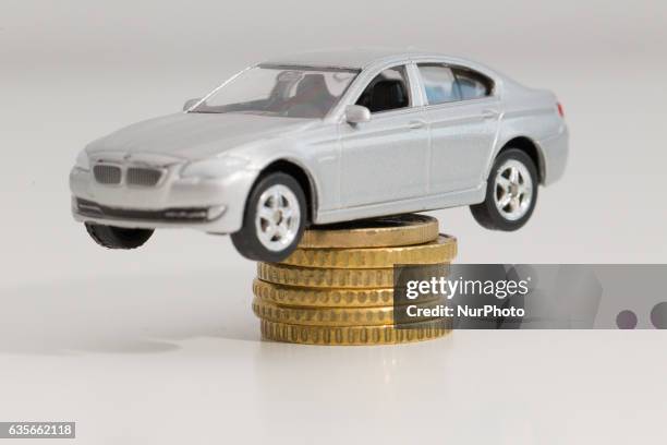 Model car is seen with Euro currency units.