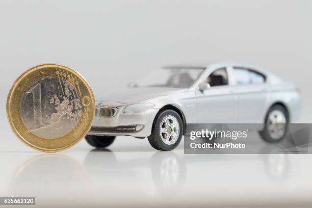 Model car is seen with Euro currency units.