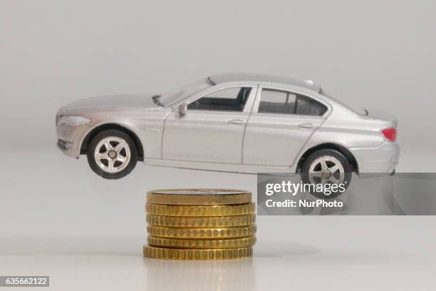 Model car is seen with Euro currency units.